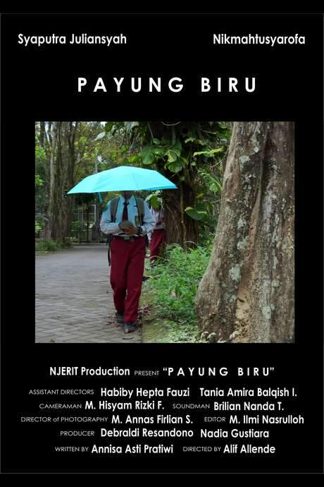    Tells a story about a shy, very young boy with his Blue Umbrella that he carried all along.  